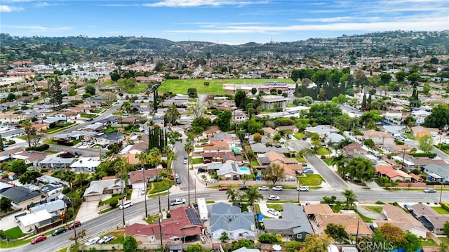 drone / aerial view with a mountain view and a residential view