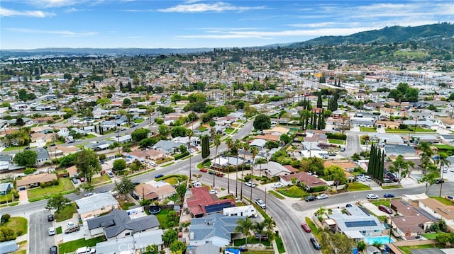 drone / aerial view with a mountain view and a residential view