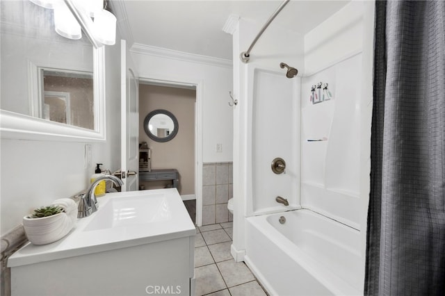 full bath with wainscoting, shower / bath combo with shower curtain, tile patterned flooring, crown molding, and vanity