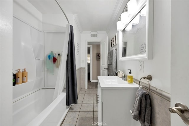 full bathroom with tile patterned flooring, visible vents, vanity, ornamental molding, and shower / bath combo