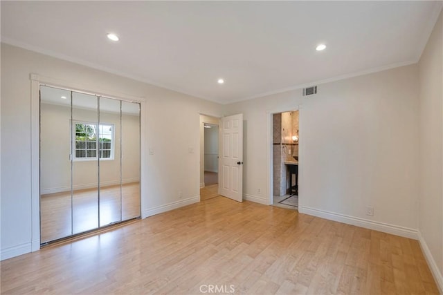 18342 Avolinda Dr, Yorba Linda, CA 92886 - unfurnished bedroom with light wood finished floors, baseboards, recessed lighting, ornamental molding, and a closet