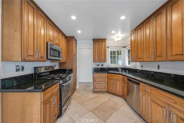 18342 Avolinda Dr, Yorba Linda, CA 92886 - kitchen featuring stainless steel appliances, a sink, brown cabinets, recessed lighting, and light tile patterned floors
