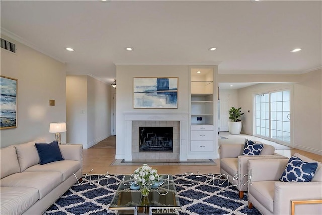 18342 Avolinda Dr, Yorba Linda, CA 92886 - living room featuring baseboards, a fireplace, recessed lighting, ornamental molding, and wood finished floors