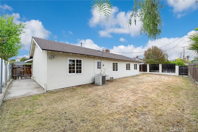 18342 Avolinda Dr, Yorba Linda, CA 92886 - rear view of house with cooling unit, stucco siding, and a shingled roof