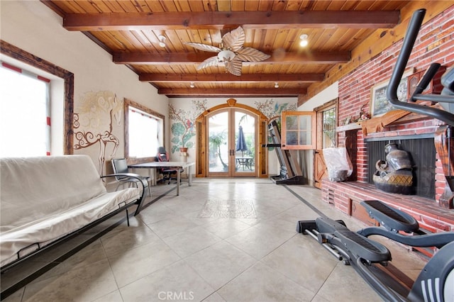 interior space with wooden ceiling, french doors, beam ceiling, and a wood stove