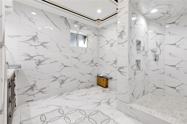 bathroom featuring recessed lighting, marble finish floor, and a marble finish shower