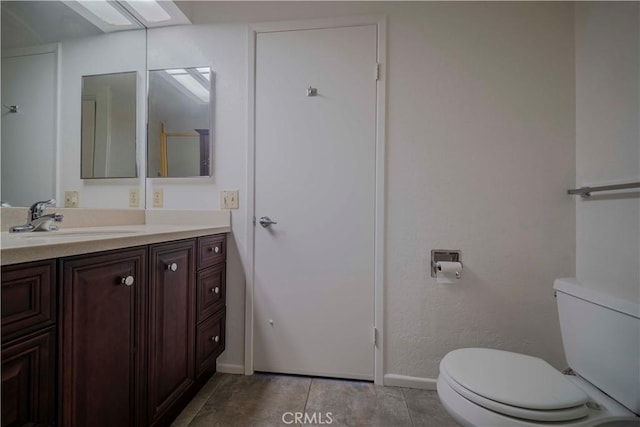47673 Desert Sage Ct, Palm Desert, CA 92260 - bathroom featuring toilet, baseboards, and vanity