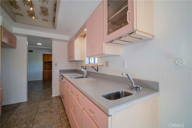 47673 Desert Sage Ct, Palm Desert, CA 92260 - kitchen featuring a sink, light countertops, glass insert cabinets, and dark tile patterned floors