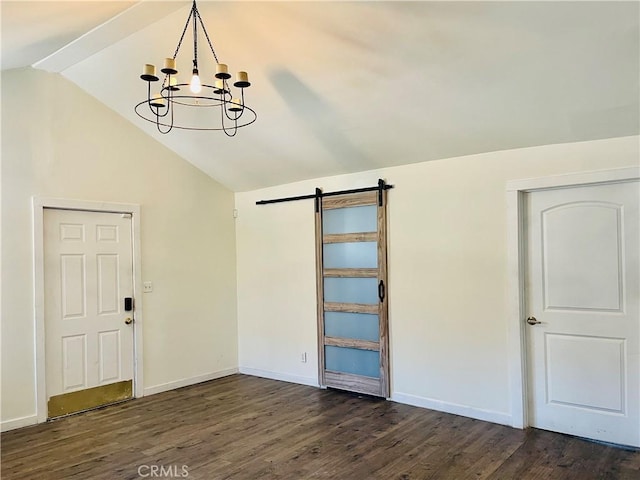 4225 Poplar Trl, Frazier Park, CA 93225 - spare room with baseboards, a barn door, a chandelier, lofted ceiling, and dark wood-style floors