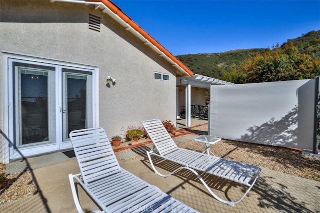view of patio / terrace featuring a pergola