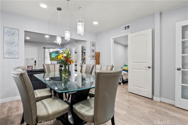 13118 Hoyt St, Pacoima, CA 91331 - dining room with baseboards, visible vents, recessed lighting, and light wood-type flooring