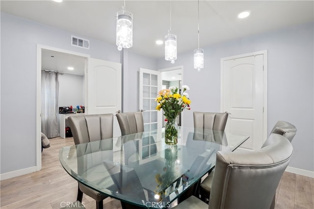 13118 Hoyt St, Pacoima, CA 91331 - dining area featuring recessed lighting, baseboards, light wood-style floors, and visible vents