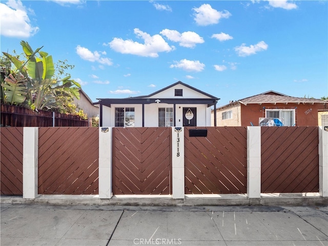13118 Hoyt St, Pacoima, CA 91331 - view of front of property with a gate and a fenced front yard