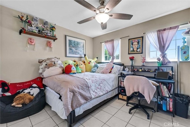 bedroom with light tile patterned floors and ceiling fan