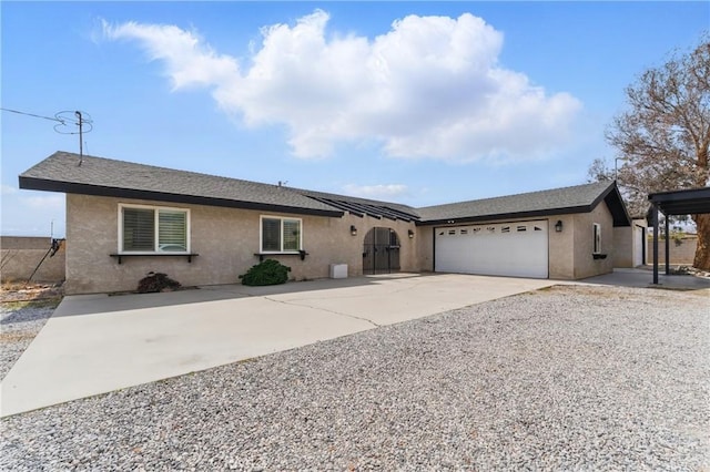 single story home with driveway, stucco siding, a garage, and roof with shingles