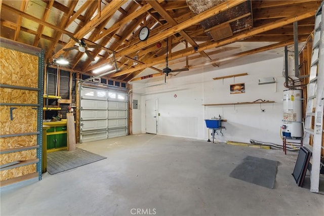 garage with strapped water heater