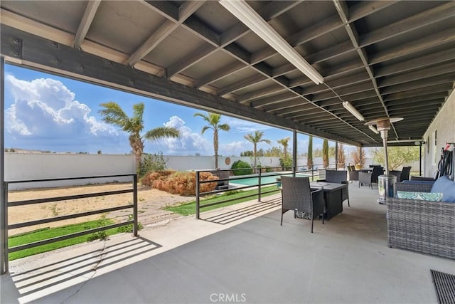 view of patio with an outdoor living space and outdoor dining space