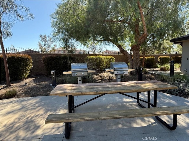 34306 Kensington St, Murrieta, CA 92563 - view of patio featuring a fenced backyard and area for grilling