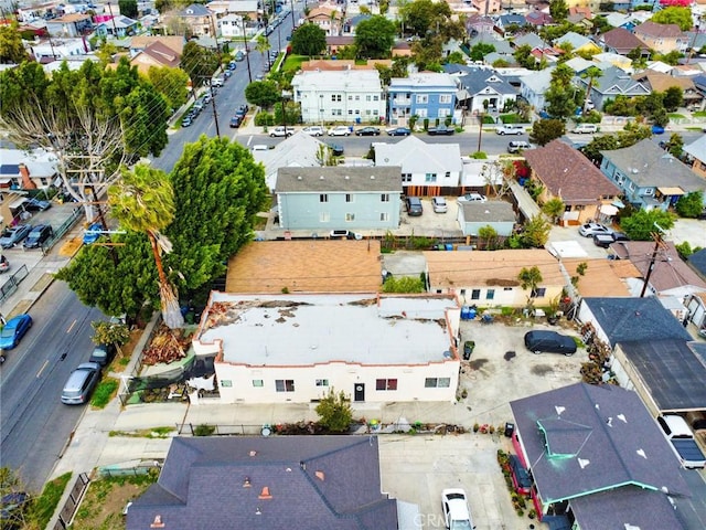 birds eye view of property with a residential view