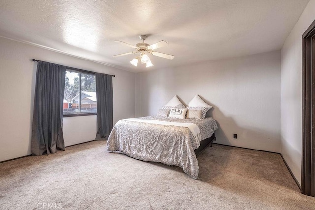 1066 Paradise Way, Big Bear City, CA 92314 - bedroom with carpet floors, a textured ceiling, and a ceiling fan