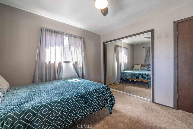 1066 Paradise Way, Big Bear City, CA 92314 - bedroom with a closet, carpet, and a ceiling fan