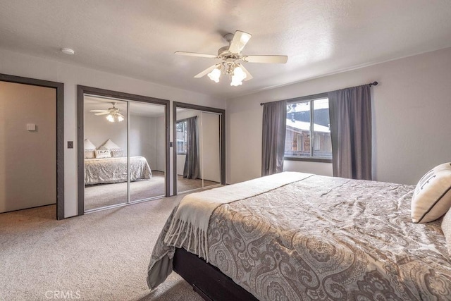 1066 Paradise Way, Big Bear City, CA 92314 - bedroom with multiple closets, carpet floors, and a ceiling fan