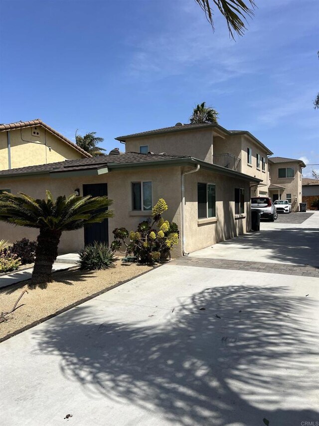11311135 Emory St, Imperial Beach, CA 91932 - view of side of property featuring driveway and stucco siding