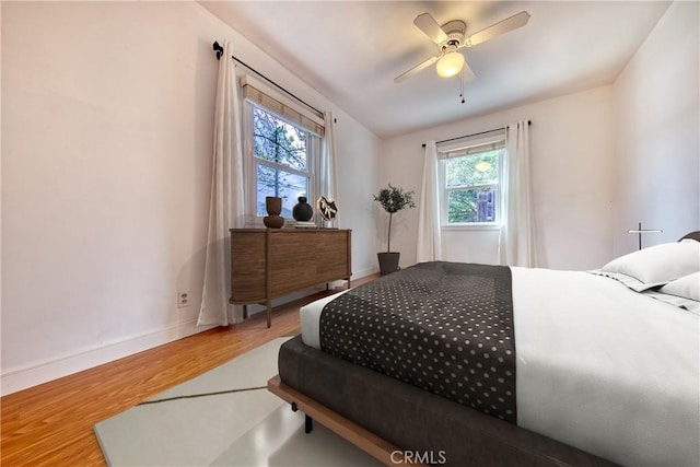 3611 4th Ave, La Crescenta, CA 91214 - bedroom with multiple windows, wood finished floors, baseboards, and a ceiling fan