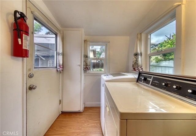 3611 4th Ave, La Crescenta, CA 91214 - laundry area with washer and dryer, healthy amount of natural light, and light wood-type flooring