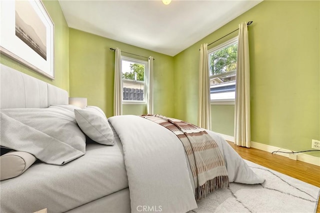 3611 4th Ave, La Crescenta, CA 91214 - bedroom featuring multiple windows, wood finished floors, and baseboards