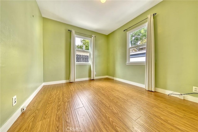 3611 4th Ave, La Crescenta, CA 91214 - unfurnished room featuring wood finished floors, plenty of natural light, and baseboards