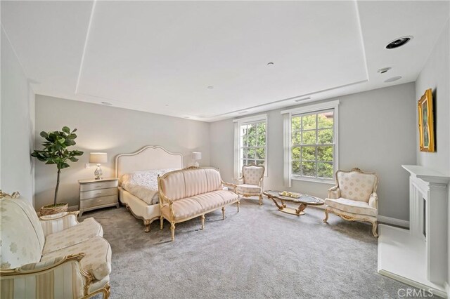 bedroom with carpet and baseboards