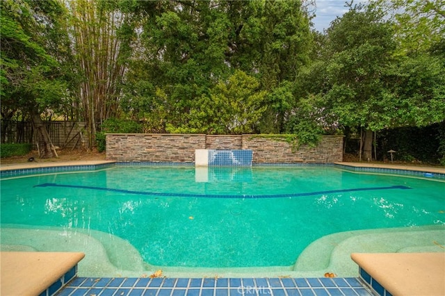 view of pool featuring a fenced in pool and a fenced backyard