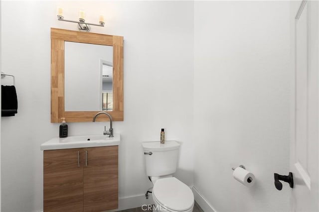 14445 Dove Canyon Dr, Riverside, CA 92503 - half bathroom featuring toilet, baseboards, and vanity