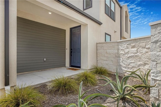 27824 Marquee Dr, Valencia, CA 91381 - doorway to property with stucco siding