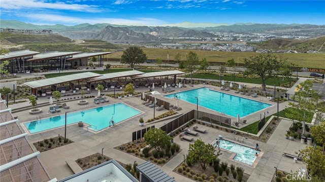 27824 Marquee Dr, Valencia, CA 91381 - community pool featuring a mountain view and a hot tub