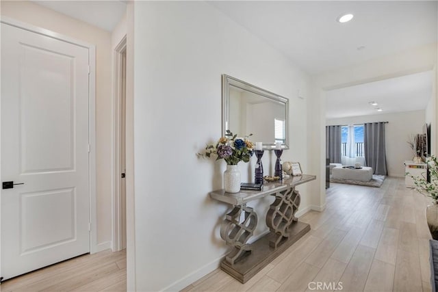 27824 Marquee Dr, Valencia, CA 91381 - hallway featuring light wood finished floors and recessed lighting