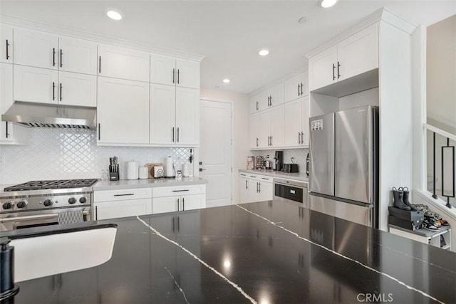 27824 Marquee Dr, Valencia, CA 91381 - kitchen featuring stainless steel appliances, under cabinet range hood, backsplash, white cabinetry, and recessed lighting