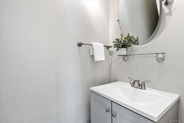 888 Cherrywood Way Unit 20, El Cajon, CA 92021 - bathroom featuring a textured wall and vanity