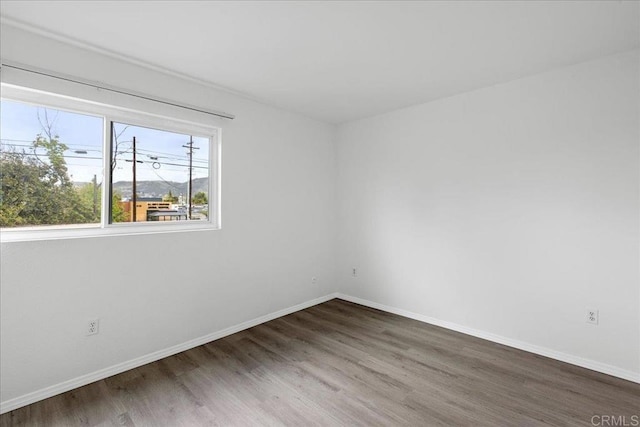 888 Cherrywood Way Unit 20, El Cajon, CA 92021 - unfurnished room featuring baseboards and wood finished floors