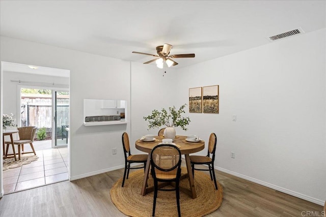 888 Cherrywood Way Unit 20, El Cajon, CA 92021 - dining space with baseboards, visible vents, wood finished floors, and ceiling fan