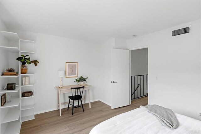 888 Cherrywood Way Unit 20, El Cajon, CA 92021 - bedroom with wood finished floors, baseboards, and visible vents