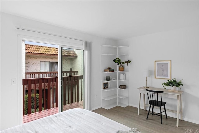 888 Cherrywood Way Unit 20, El Cajon, CA 92021 - bedroom with baseboards, access to outside, and wood finished floors