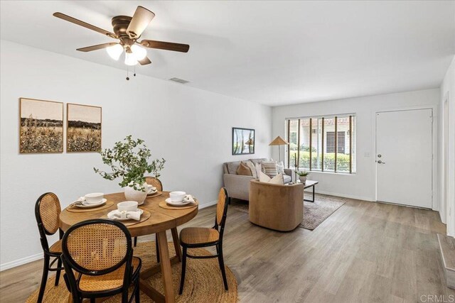 888 Cherrywood Way Unit 20, El Cajon, CA 92021 - dining room with baseboards, light wood finished floors, and ceiling fan