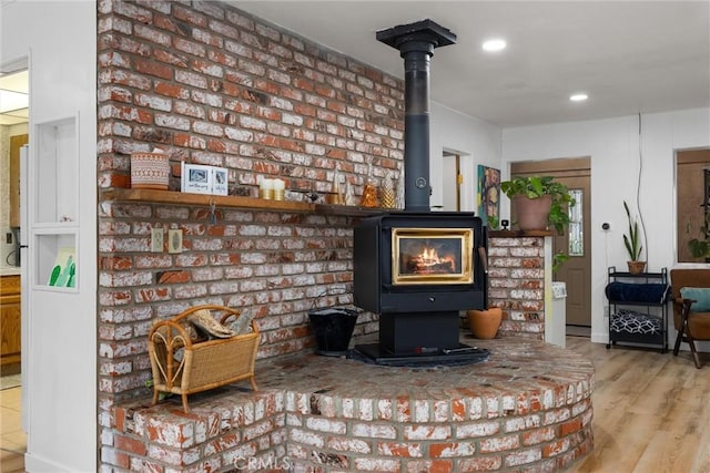 4228 Willow Trl, Frazier Park, CA 93225 - living room featuring wood finished floors, recessed lighting, and a wood stove