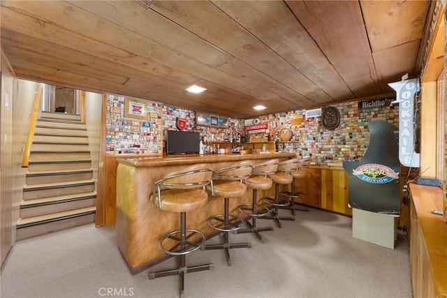 4228 Willow Trl, Frazier Park, CA 93225 - bar featuring wood ceiling, indoor bar, carpet, and stairway