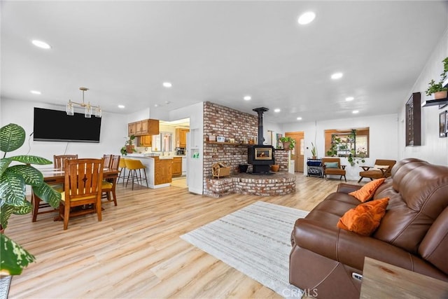 4228 Willow Trl, Frazier Park, CA 93225 - living room with light wood finished floors, a wood stove, and recessed lighting