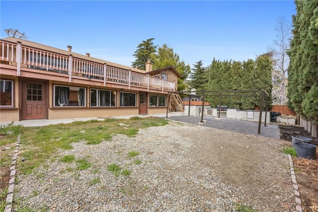 4228 Willow Trl, Frazier Park, CA 93225 - rear view of property with stairs, fence, a deck, and a patio area