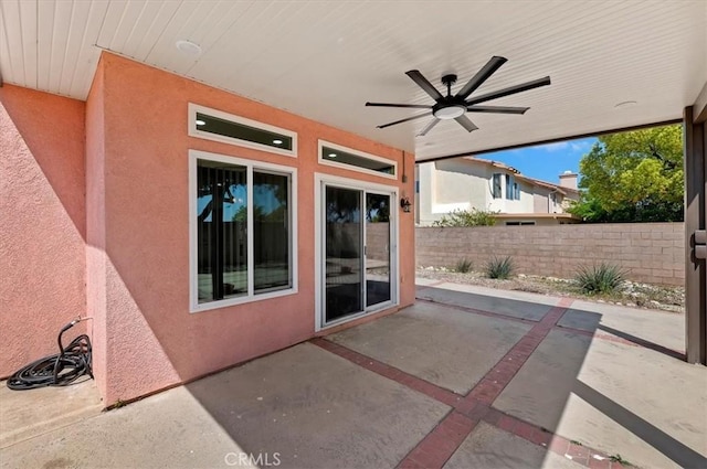 2583 W Fairview Dr, Rialto, CA 92377 - view of patio featuring a ceiling fan and fence