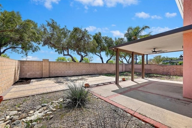 2583 W Fairview Dr, Rialto, CA 92377 - view of yard featuring a patio and a fenced backyard